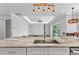 Spacious kitchen island with stainless steel sink and granite countertop at 3712 Carmichael Dr, Punta Gorda, FL 33950