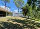 Expansive backyard featuring a well-maintained lawn and a picturesque water view at 3721 Adelaide Ave, North Port, FL 34288