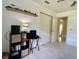 Bedroom featuring shelving, a record player, and a closet at 3721 Adelaide Ave, North Port, FL 34288