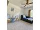 Bright bedroom with a comfortable chaise lounge and nautical-themed decor and a ceiling fan at 3721 Adelaide Ave, North Port, FL 34288