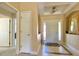 Welcoming foyer with tile flooring, decorative niche, and front door at 3721 Adelaide Ave, North Port, FL 34288