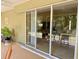 Screened lanai with a peek into the house at 3721 Adelaide Ave, North Port, FL 34288