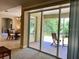 A beautiful outdoor patio as seen through the glass door at 3721 Adelaide Ave, North Port, FL 34288