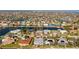 Expansive aerial view showcases the waterfront community, canal access, and neighborhood layout at 441 Norma Ct, Punta Gorda, FL 33950