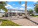 Extended brick paver patio with screened enclosure, perfect for outdoor entertaining and relaxation at 441 Norma Ct, Punta Gorda, FL 33950