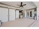 Outdoor entertaining space featuring a sink, toilet, TV and easy access to the pool at 441 Norma Ct, Punta Gorda, FL 33950