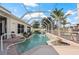Enclosed pool area featuring serene water, mature landscaping, and easy access to the home's interior at 441 Norma Ct, Punta Gorda, FL 33950