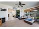 Inviting sunroom with large windows, comfortable wicker furniture, and seamless indoor-outdoor living at 441 Norma Ct, Punta Gorda, FL 33950