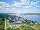 Breathtaking aerial view of a waterfront neighborhood along the river showcasing a picturesque community at 5194 Cooper Ter, Port Charlotte, FL 33981