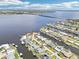 Waterfront community homes feature private docks providing access to a wide body of water at 5194 Cooper Ter, Port Charlotte, FL 33981