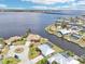 Waterfront community with homes featuring private docks, pools, and lush tropical landscaping at 5194 Cooper Ter, Port Charlotte, FL 33981