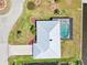 An aerial view of home featuring a screened pool and well-maintained landscaping at 5194 Cooper Ter, Port Charlotte, FL 33981