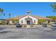 Attractive exterior of the fitness center with ample parking and manicured landscaping at 5428 Royal Poinciana Way, North Port, FL 34291