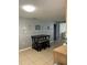 Cozy kitchen with tile flooring, a dining table and views into other rooms at 705 Crestview Nw Cir, Port Charlotte, FL 33948