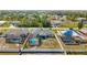 Aerial view of the property with pool, backyard, and patio at 7434 Ashtabula St, Englewood, FL 34224