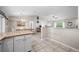 Spacious interior view from the kitchen, extending into the dining and living areas at 7434 Ashtabula St, Englewood, FL 34224