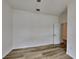 A bedroom featuring wood floors, a ceiling fan, a window and a closet at 7474 Manville Ter, Port Charlotte, FL 33981