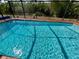 This sparkling blue pool is completely screened in for year round enjoyment at 1305 Alton Rd, Port Charlotte, FL 33952