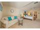 Spacious main bedroom features sitting area, a king bed, plenty of closet space and natural light at 13235 Essman Ave, Port Charlotte, FL 33953