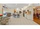 Spacious open kitchen with large center island and breakfast bar seating in a large open concept layout at 149 Albert Ln, Port Charlotte, FL 33954