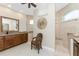 Elegant bathroom with dual vanities, tiled showers, and decorative accents at 15762 Aqua Cir, Port Charlotte, FL 33981