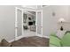 Transitional living room visible through french doors from home office at 15762 Aqua Cir, Port Charlotte, FL 33981