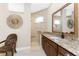 Shower area with built-in seating, tiled walls, and stylish fixtures at 15762 Aqua Cir, Port Charlotte, FL 33981