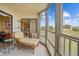 Inviting sunroom with large windows offering lots of natural light at 175 Kings Hwy # 226, Punta Gorda, FL 33983