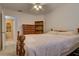 Bedroom featuring wood furniture and a view to another room at 18106 Petoskey Cir, Port Charlotte, FL 33948