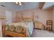Comfortable bedroom with floral bedding and natural light, creating a calming atmosphere at 18106 Petoskey Cir, Port Charlotte, FL 33948