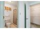 Bathroom featuring a shower, walk-in closet, and toilet at 2192 Hyatt Dr, Port Charlotte, FL 33948