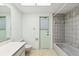Bathroom with a shower/tub, neutral color scheme, and a garden window at 2192 Hyatt Dr, Port Charlotte, FL 33948