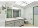 Bathroom featuring a shower/tub combo, tiled floors, and a sink at 2192 Hyatt Dr, Port Charlotte, FL 33948
