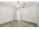 Bedroom with neutral walls, fan, and muted green painted trim at 2192 Hyatt Dr, Port Charlotte, FL 33948