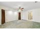 The primary bedroom has a ceiling fan and neutral wall color at 2192 Hyatt Dr, Port Charlotte, FL 33948