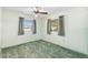 Bedroom featuring neutral walls, and two large windows for natural light at 2192 Hyatt Dr, Port Charlotte, FL 33948