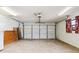 Spacious garage with ample room for parking and storage, featuring a functional garage door at 2192 Hyatt Dr, Port Charlotte, FL 33948