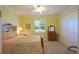 Bedroom with ceiling fan, soft carpet, and queen-sized bed at 2227 Bonn Ct, Punta Gorda, FL 33983