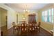 Dining room featuring a chandelier, wood floors, and an open floor plan at 2227 Bonn Ct, Punta Gorda, FL 33983