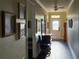 Inviting foyer featuring hardwood floors, elegant decor, and a bright entryway door at 2227 Bonn Ct, Punta Gorda, FL 33983