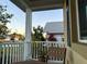 Exterior shot of a home's front porch and siding, as well as a view of the street at 2227 Bonn Ct, Punta Gorda, FL 33983