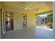 View of the covered and screened lanai, as well as the home's backyard at 2227 Bonn Ct, Punta Gorda, FL 33983