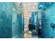 Modern bathroom with glass shower and mosaic tile at 24139 Jolly Roger Blvd, Punta Gorda, FL 33955
