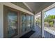Unique glass paneled front doors providing natural light to the home at 24139 Jolly Roger Blvd, Punta Gorda, FL 33955