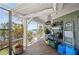 Large covered patio with outdoor cooking and waterfront views at 24139 Jolly Roger Blvd, Punta Gorda, FL 33955