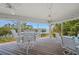 Waterfront patio is perfect for outdoor entertaining with a view at 24139 Jolly Roger Blvd, Punta Gorda, FL 33955