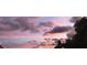 Gorgeous sunset view with an array of clouds scattered across the horizon at 24139 Jolly Roger Blvd, Punta Gorda, FL 33955