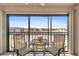 Balcony seating with view of pond at 25100 Sandhill Blvd # R202, Punta Gorda, FL 33983
