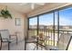 Balcony seating with view of pond at 25100 Sandhill Blvd # R202, Punta Gorda, FL 33983