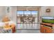 Screened in Lanai with seating, view of pond at 25100 Sandhill Blvd # R202, Punta Gorda, FL 33983